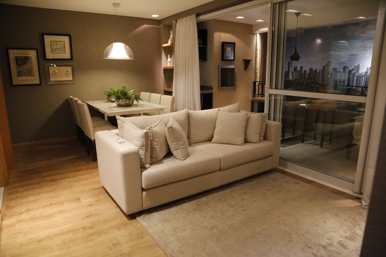 hero-img-02 Cozy living room with modern furniture and dining area, perfect for stylish home interiors.