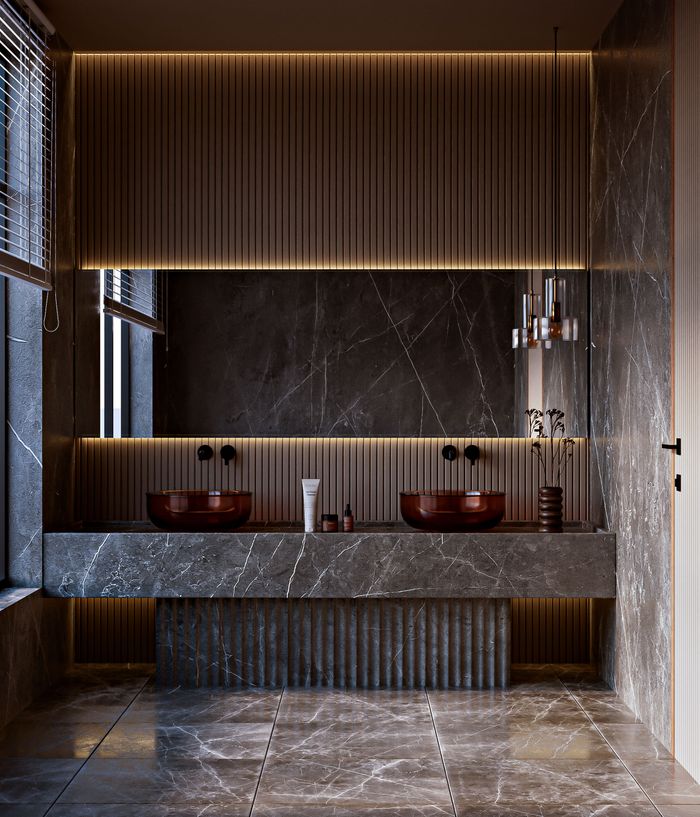 services-01 Elegant modern bathroom with marble design, double sink, and ambient warm lighting.