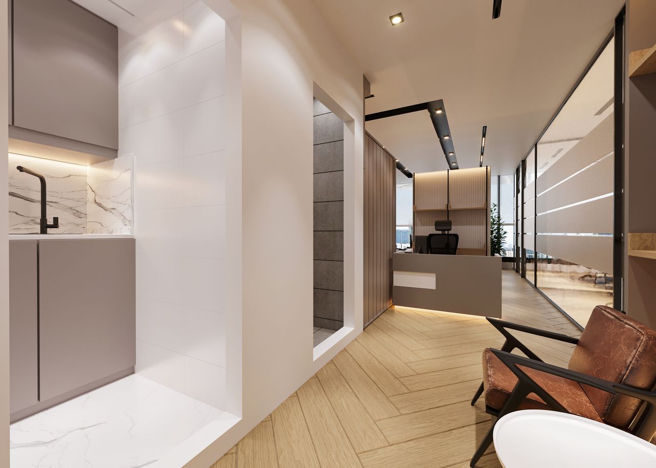why-choose-us A stylish and contemporary office interior featuring marble and wood finishes.